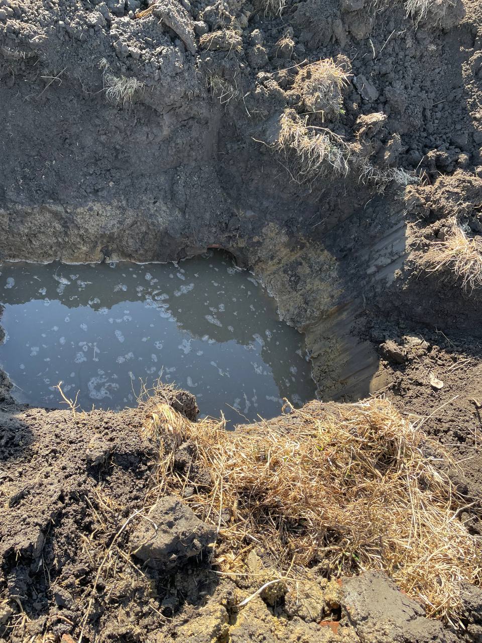 Old failed culvert pipe being removed — Brohez Trucking LLC culvert repair