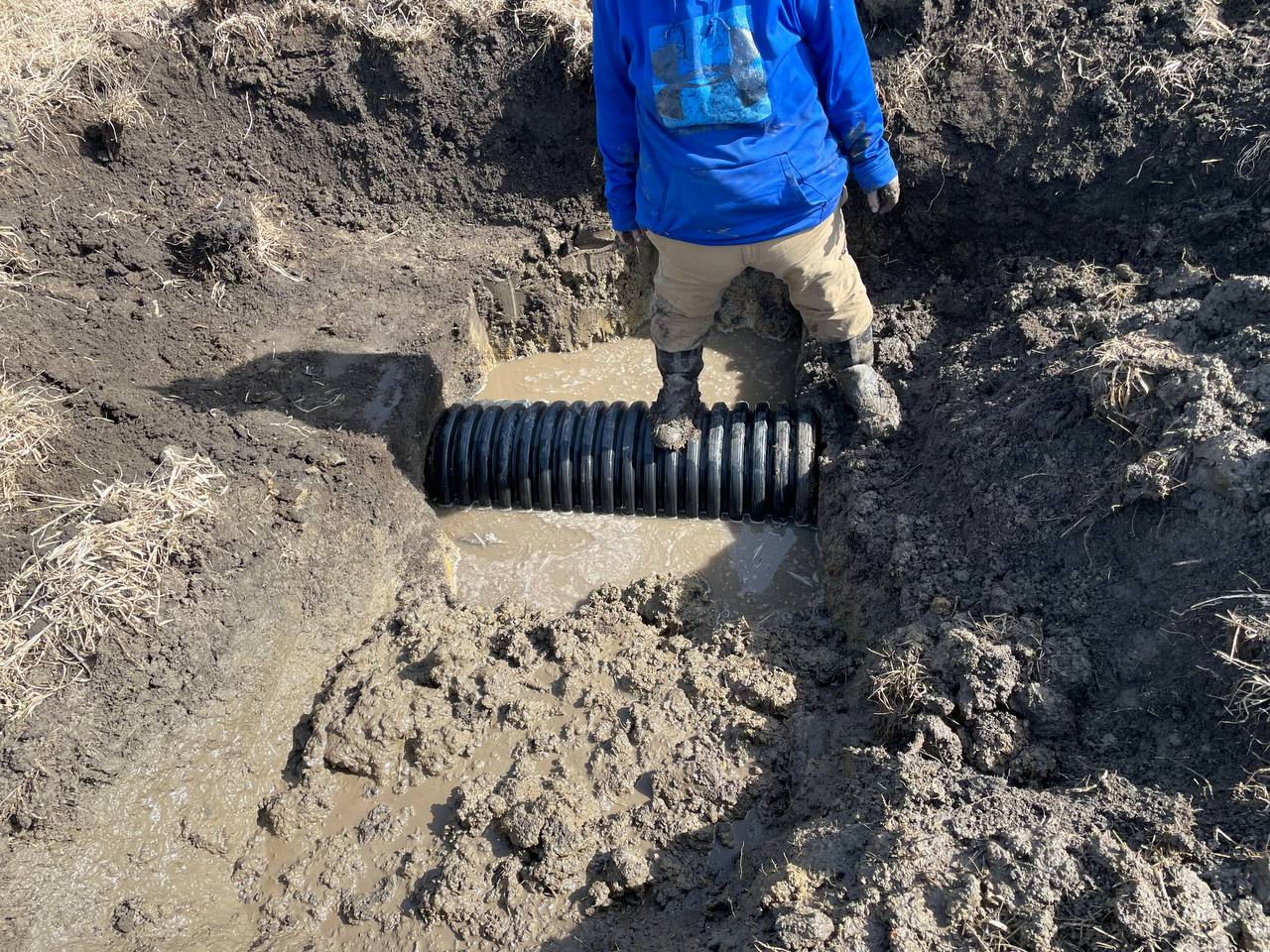 Compacting backfill over new culvert — Brohez Trucking LLC
