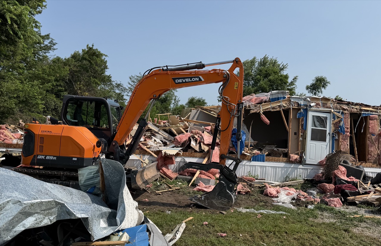 Develon DX89R-7 excavator demolishing a mobile home in central Illinois — Brohez Trucking LLC