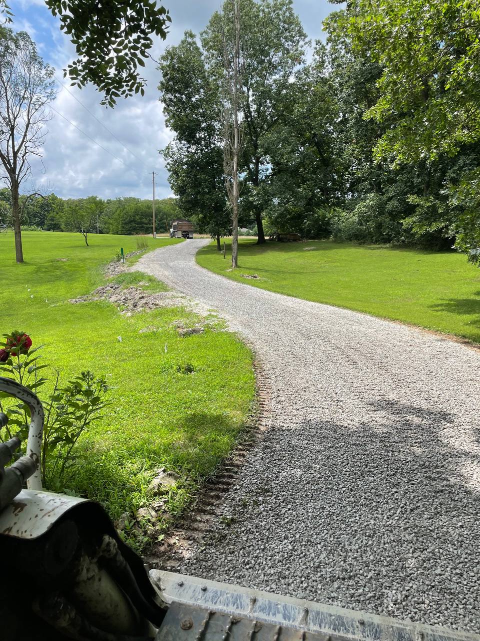 Rock driveway installation in progress — Brohez Trucking Central Illinois