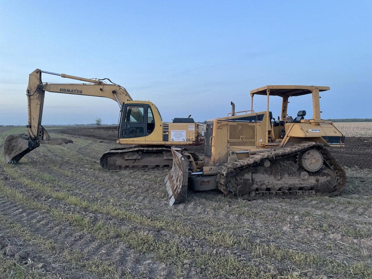 Excavator and dozer staged on a cleared and worked site in central Illinois — Brohez Trucking LLC
