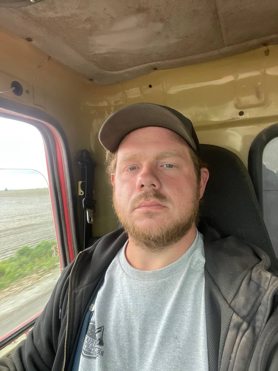 Levi Brohez — owner-operator of Brohez Trucking, Mattoon IL excavation contractor, in the cab